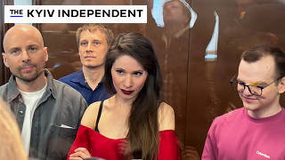 Fyra ryska journalister bakom domstolens glasvägg